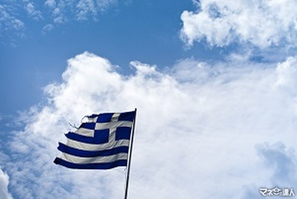 <p>torn flag of greece</p>