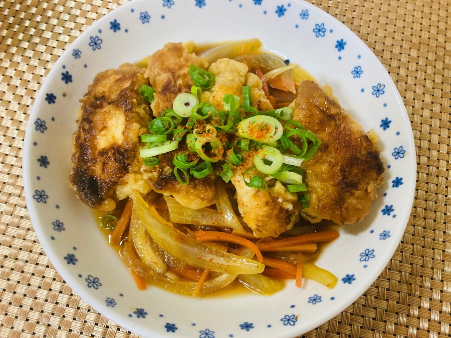 刻みねぎと一味唐辛子をトッピングして完成