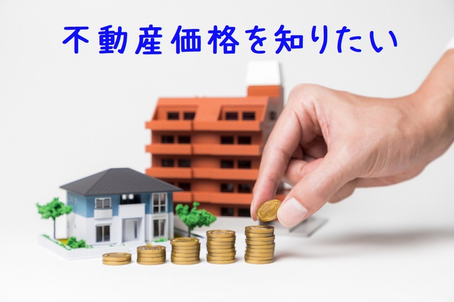 コインを積む手