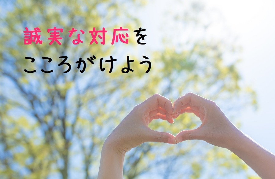 手でハートをつくる