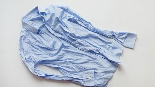 服のしわのせいで返品