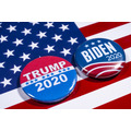 <p>London, UK – May 5th 2020: Donald Trump and Joe Biden pin badges, pictured of the USA flag.  The two men will be battling eachother in the 2020 US Presidential Election.</p>